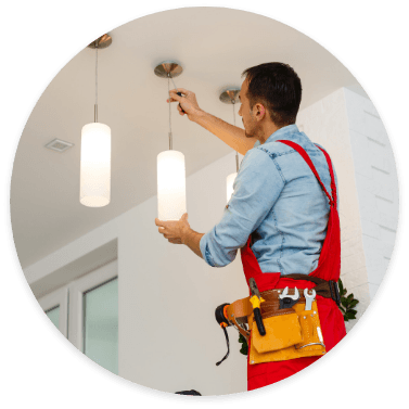 electrician installing lights