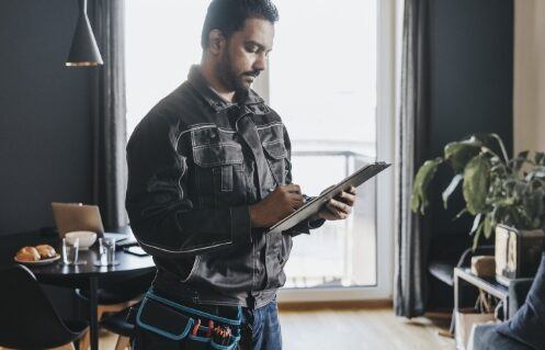 electrician inspecting home